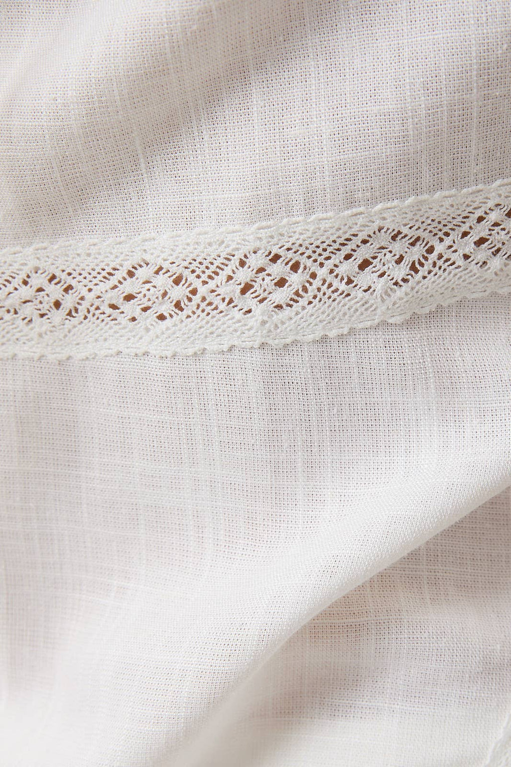 V-NECKLINE WITH TIE DETAIL TOP